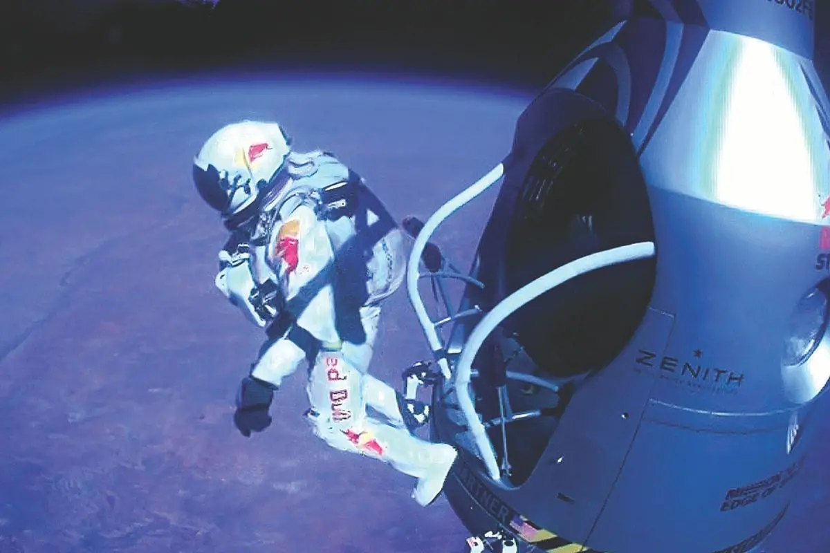 Felix Baumgartner of Austria as he jumps out of the capsule | Photo: AP