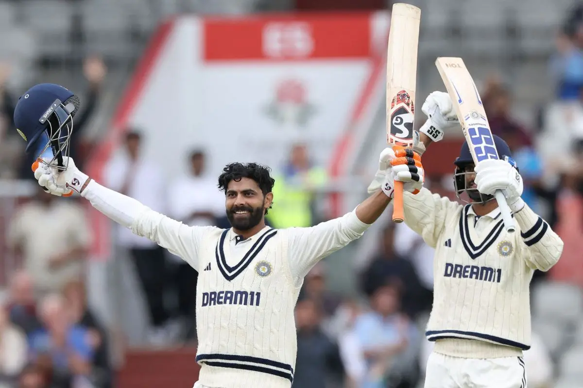 India's Ravindra Jadeja (L) celebrates after scoring a century (100 runs) on day five of the fourth cricket test match between England and India (Photo: AFP)