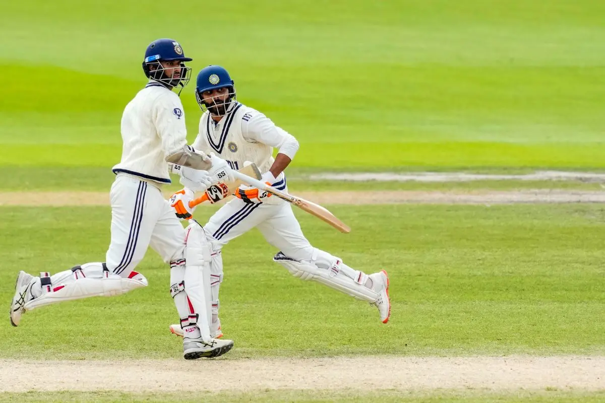 Ravindra Jadeja and Washington Sundar run between the wickets during the fifth day of the fourth Test match between India and England, at the Old Trafford cricket ground, in Manchester, England. | Photo: PTI