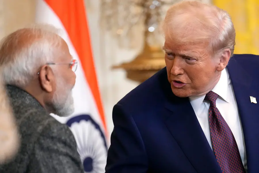 President Donald Trump, right, speaks with Prime Minister Narendra Modi