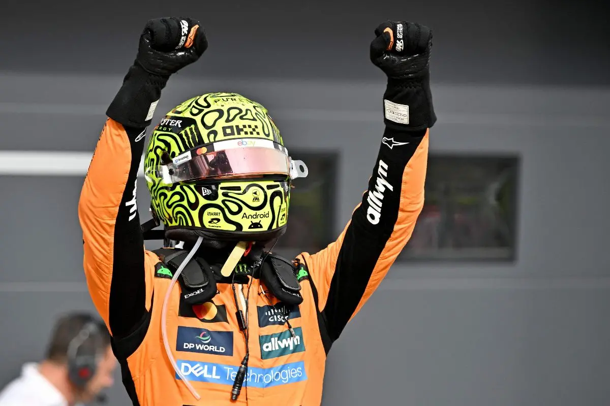 McLaren's British driver Lando Norris celebrates after winning the Formula One Hungarian Grand Prix | Photo: AFP
