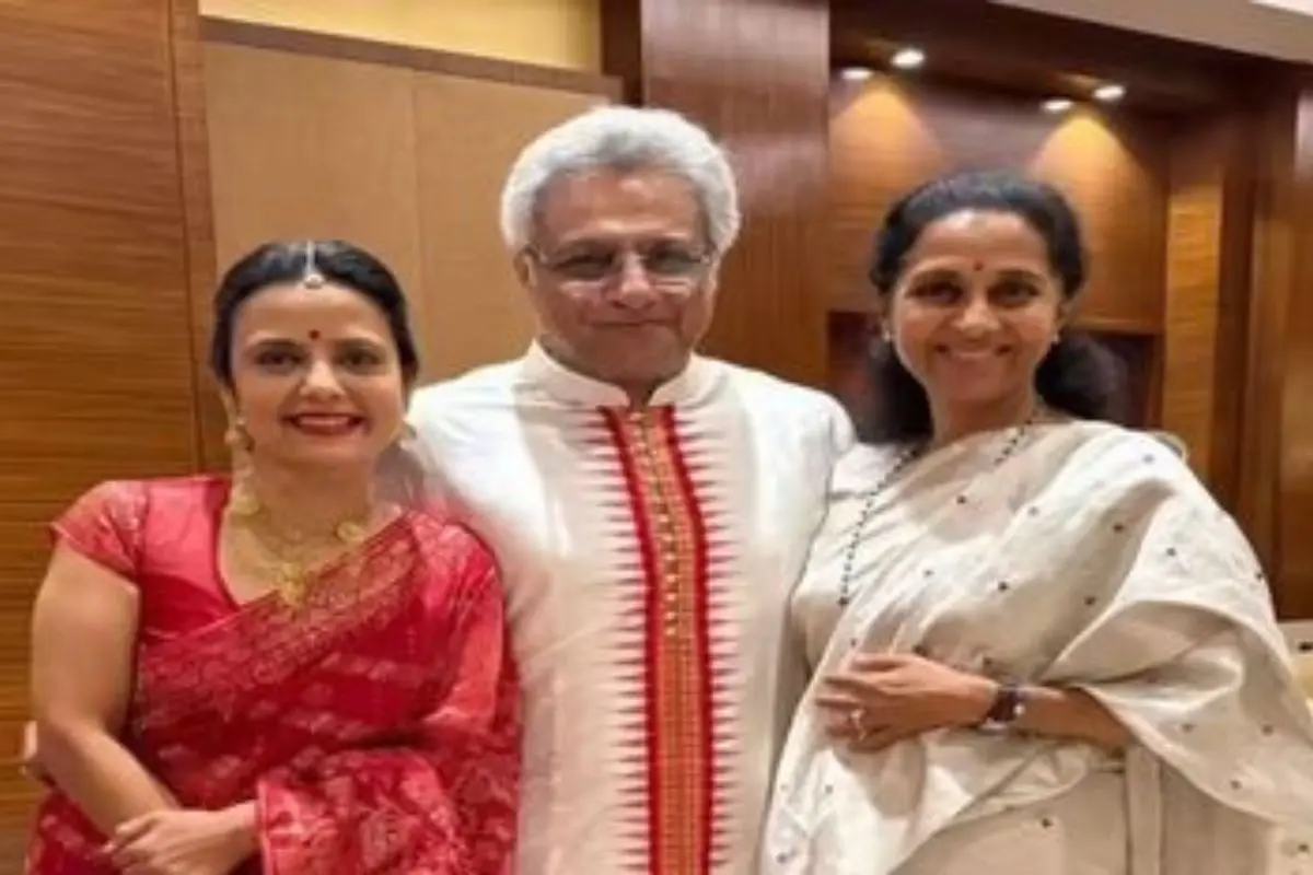TMC MP Mahua Moitra and husband Pinaki Misra share a light moment with NCP leader Supriya Sule at their wedding reception in Delhi. Photo: Instagram