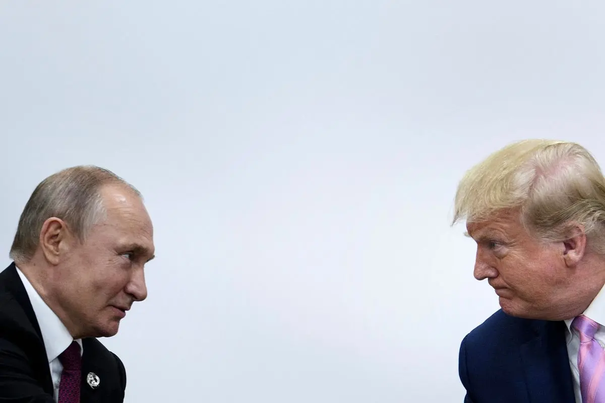 File Photo: US President Donald Trump (R) attends a meeting with Russia's President Vladimir Putin during the G20 summit in Osaka on June 28, 2019 | AFP