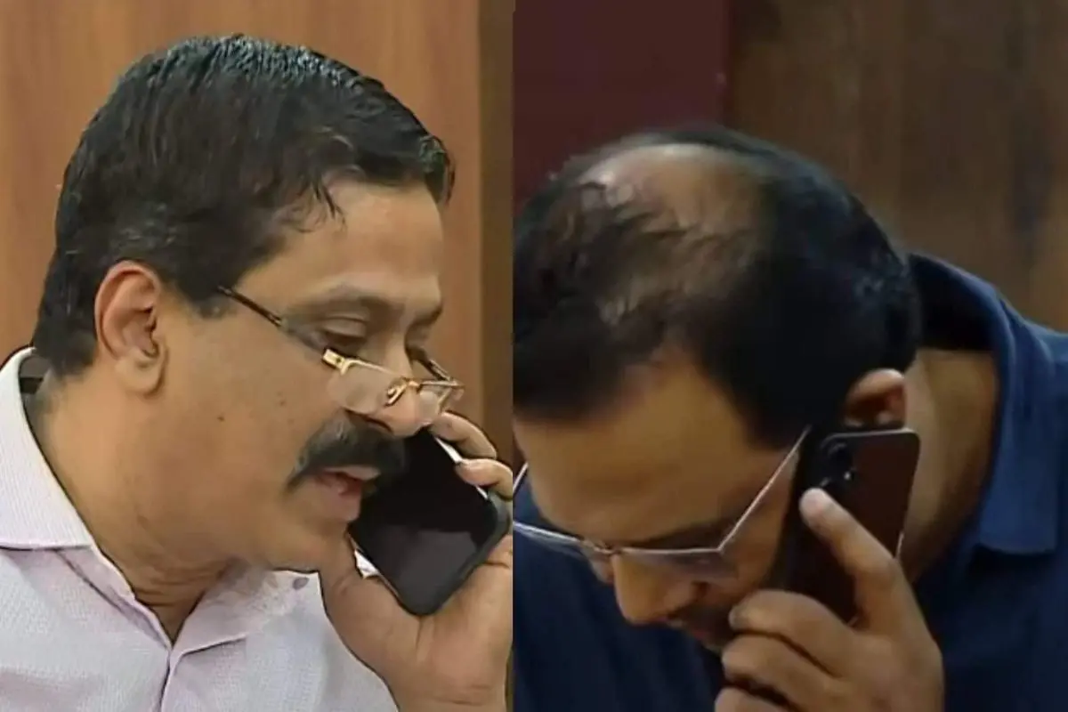 The Principal and Superintendent speaking on the phone during the press conference | Screengrab: Mathrubhumi News