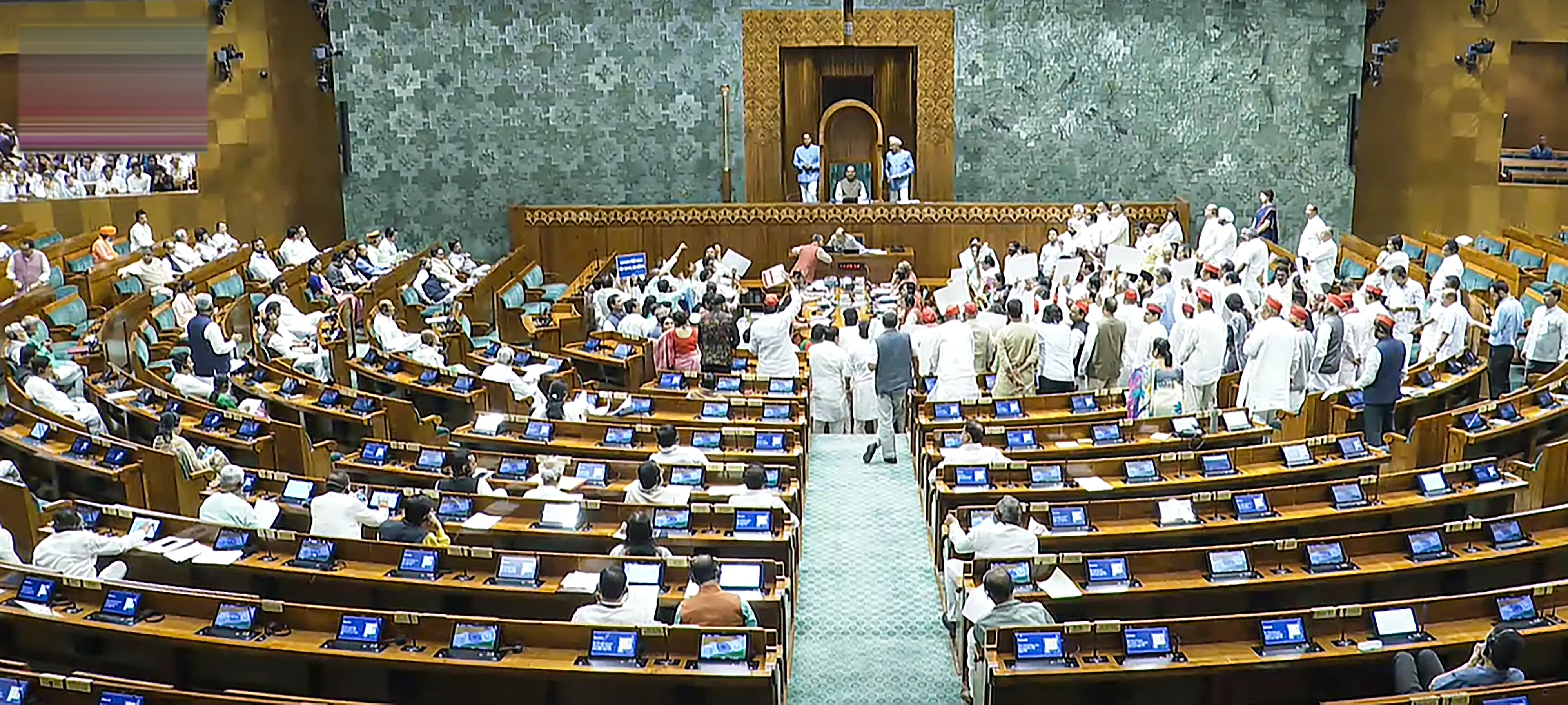Opposition Members protest in the Lok Sabha during the Monsoon session of Parliament | Photo: PTI