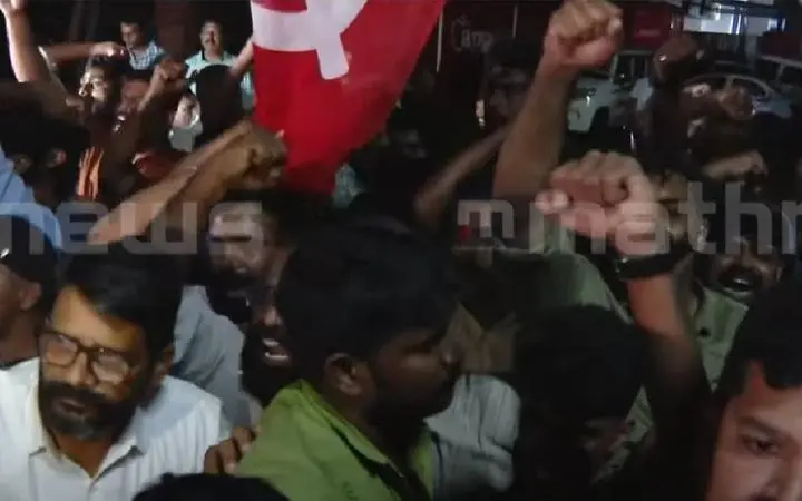 Crowd gathers during protest march in Thrissur