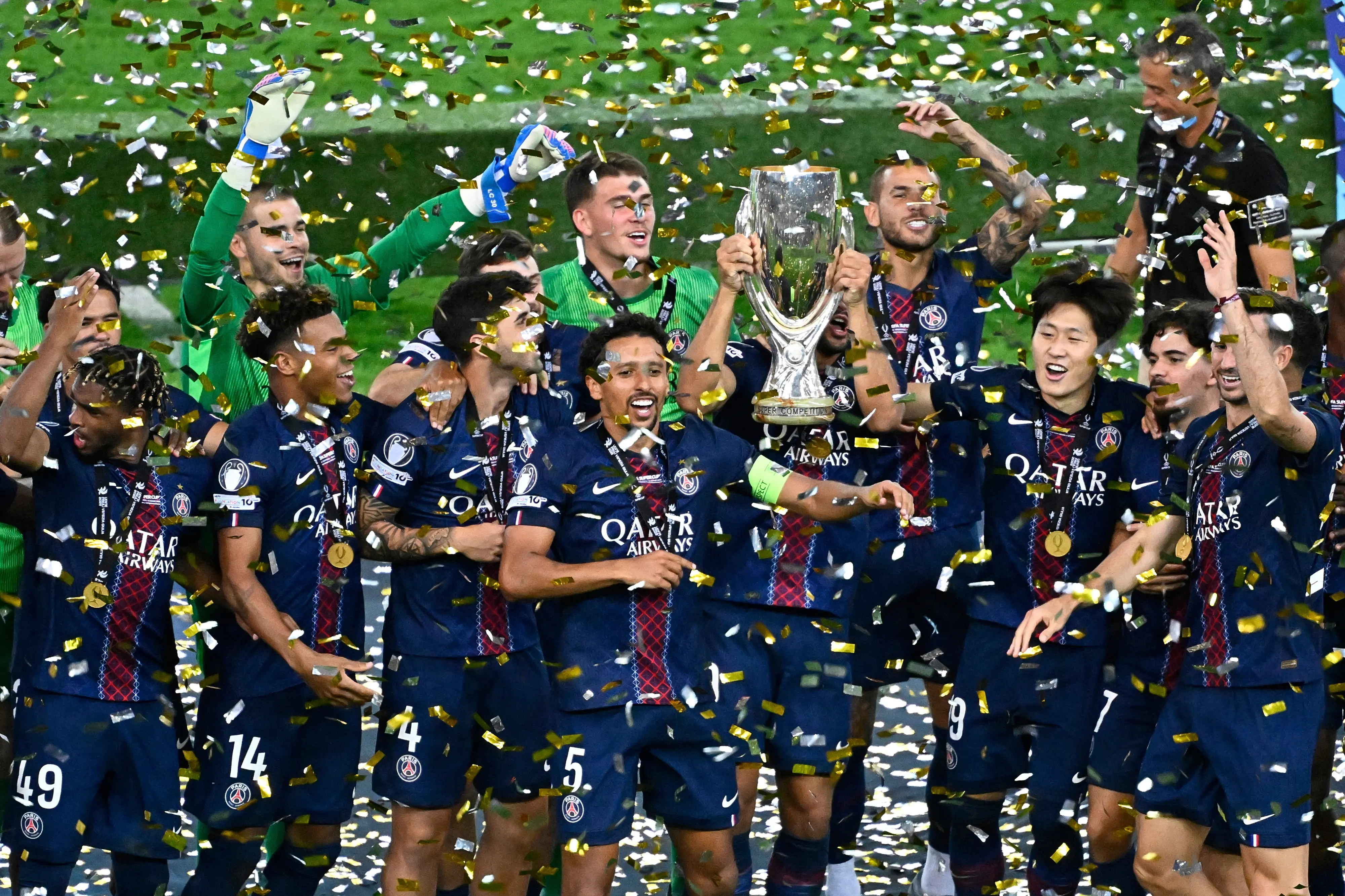 PSG's players celebrate with the trophy after the UEFA Super Cup soccer match between Paris Saint-Germain and Tottenham Hotspur in Udine, Italy | AP