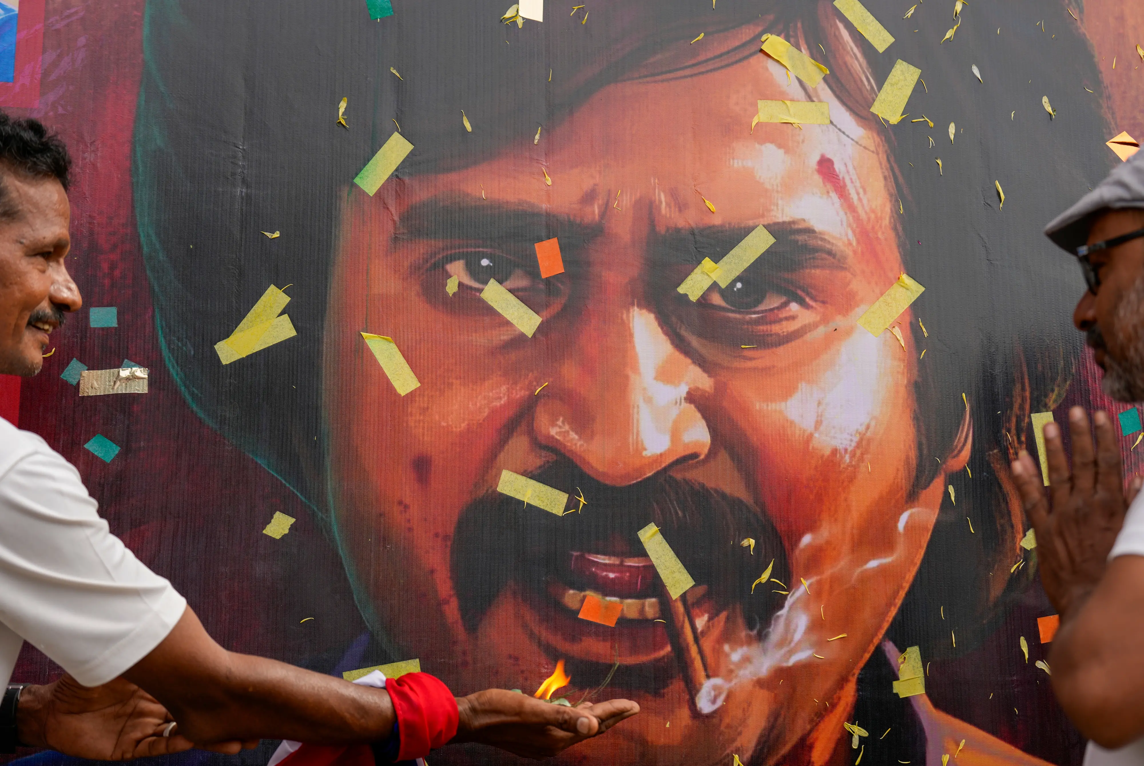 Fans of superstar Rajinikanth celebrate the release of his new film 'Coolie', outside a movie theatre in Chennai | Photo: PTI