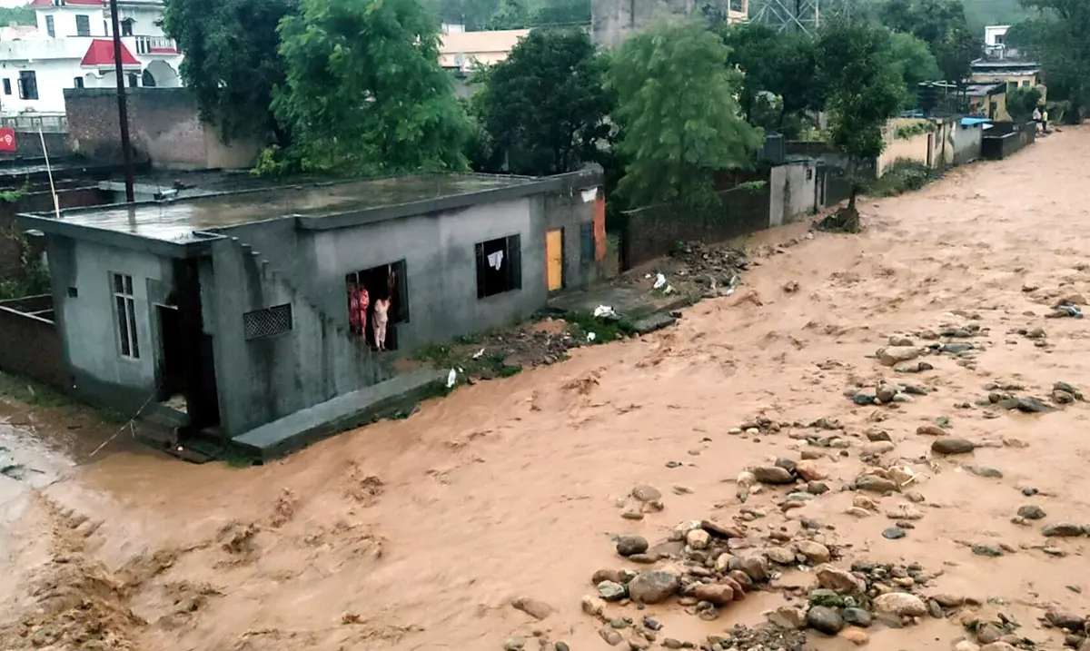 Debris and mud accumulated in a residential area following a cloudburst, in Kathua | Photo: PTI
