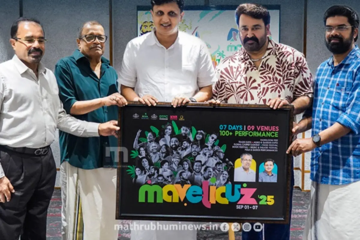 Mohanlal along with Minister P A Mohamed Riyas and others during the release of poster of 'Mavelicuz' in Kozhikode.