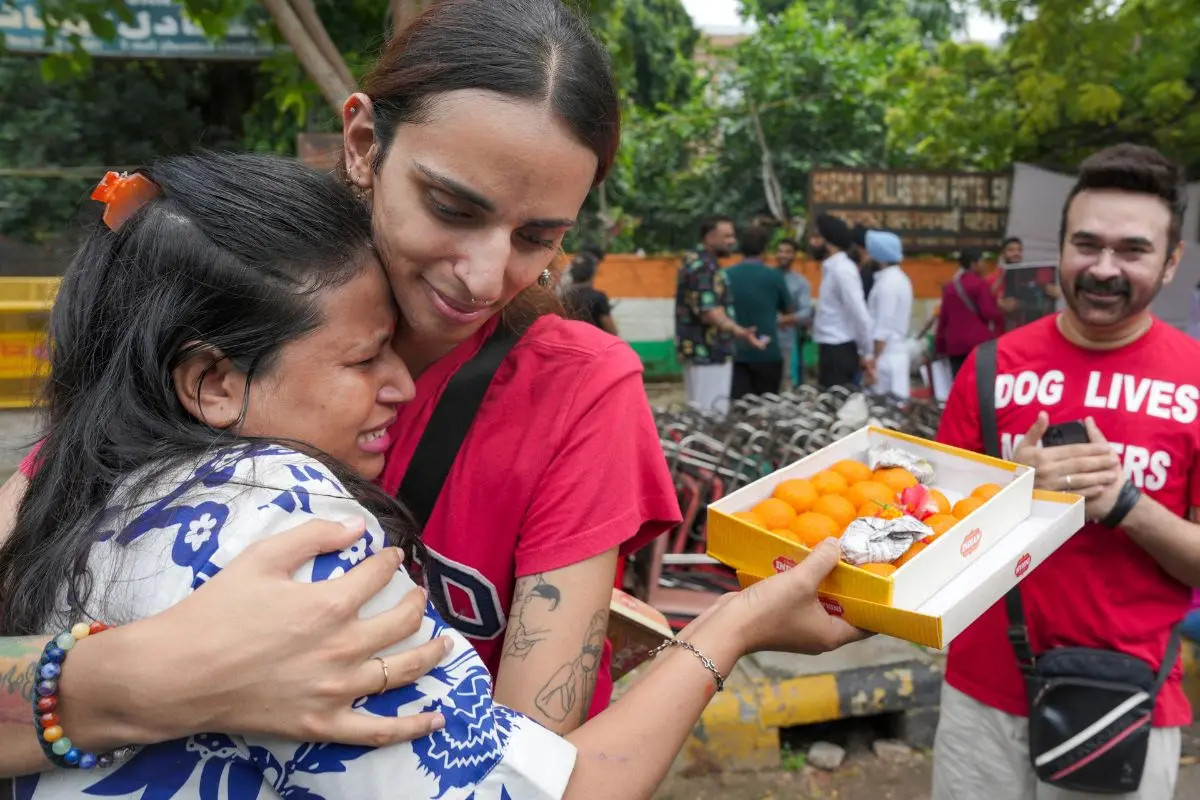 Animal lovers react after the Supreme Court's (SC) verdict on stray dogs, at Jantar Mantar, in New Delhi | Photo: PTI