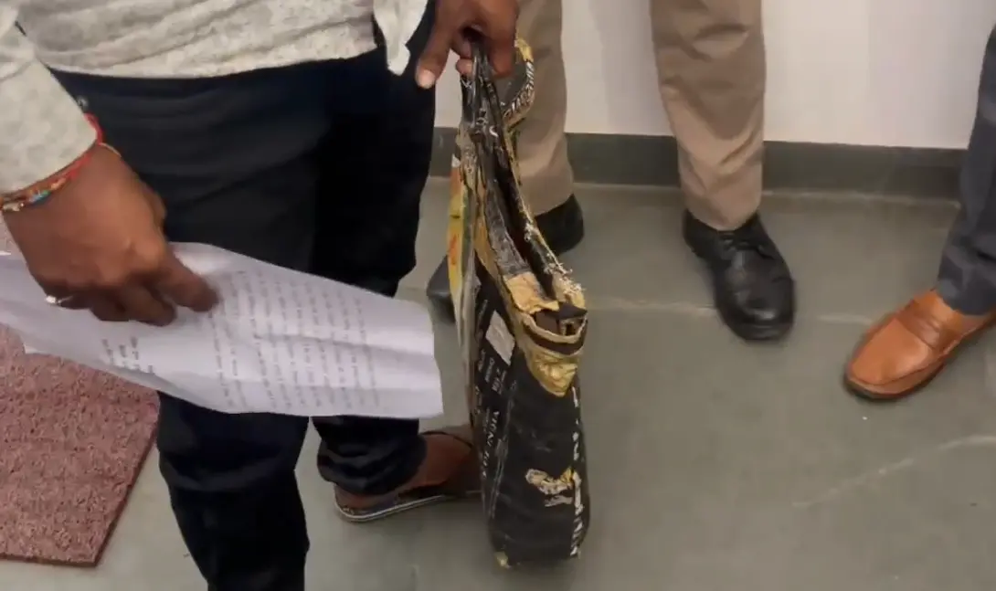 A man arrives at the Lakhimpur Kheri district collectorate carrying his stillborn child in a bag, alleging medical negligence by a private hospital