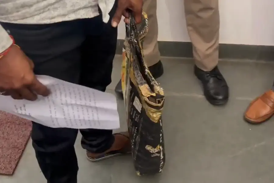 A man arrives at the Lakhimpur Kheri district collectorate carrying his stillborn child in a bag, alleging medical negligence by a private hospital