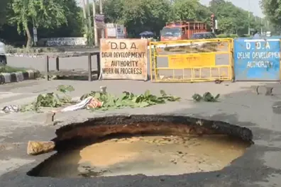 Massive crater opens near NLU Delhi after heavy rains | WATCH