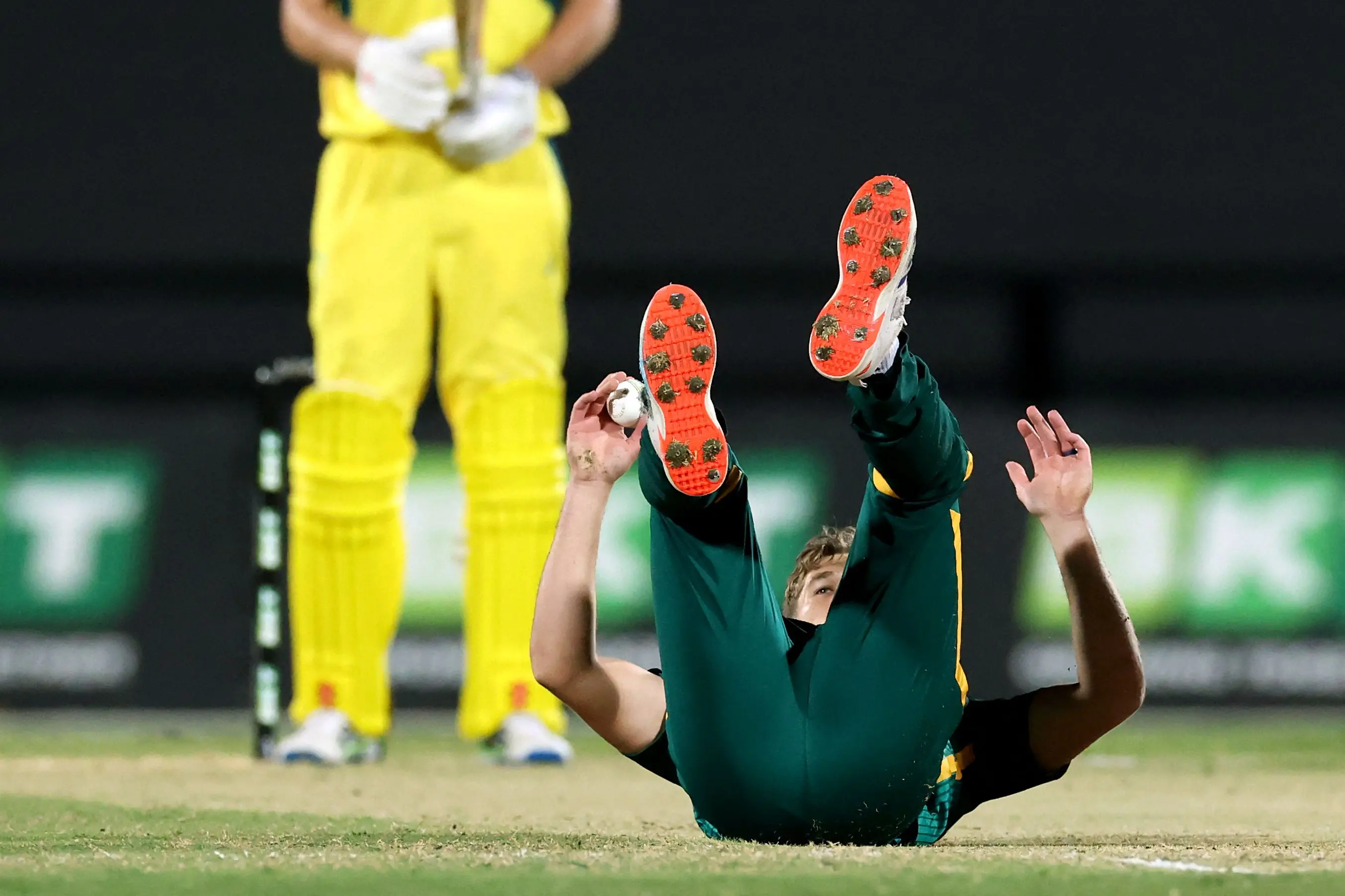 South Africa's Wiaan Mulder falls over onto the pitch during the second one-day international (ODI) cricket match between Australia and South Africa | AFP