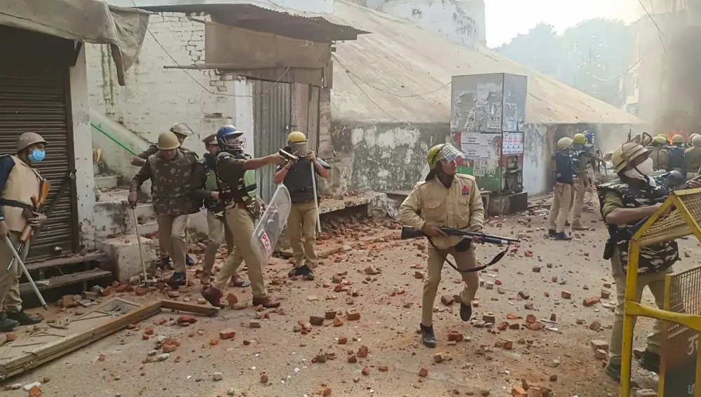 File Photo: Police try to control situation after violence erupted during the second survey of the Jama Masjid | PTI