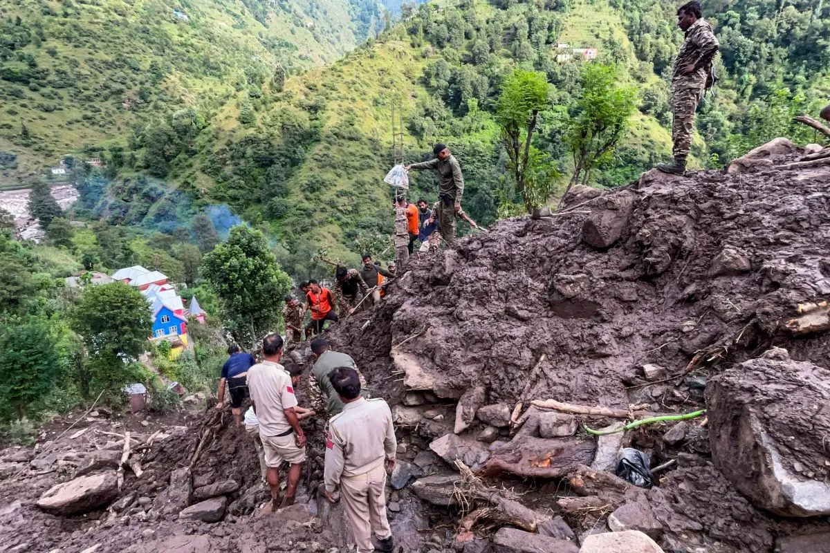 Police personnel and others during a search and rescue operation after a cloudburst following heavy rainfall, at Ramgarh, in Ramban district, Jammu and Kashmir, Saturday, Aug. 30, 2025. (PTI Photo)