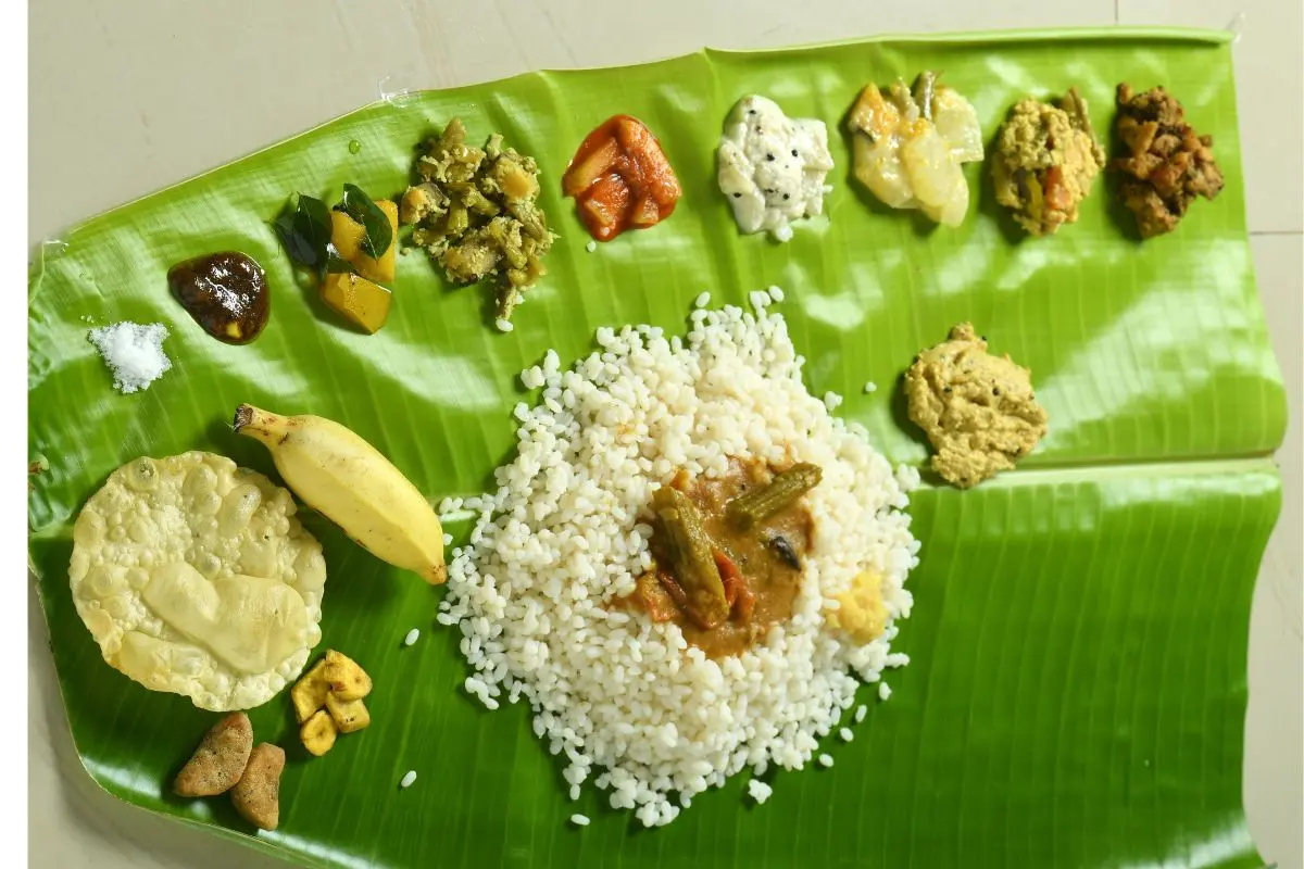 A traditional Onam sadya served on a fresh vazhayila (plantain leaf), brimming with flavours of love, culture and community. Representative photo: X