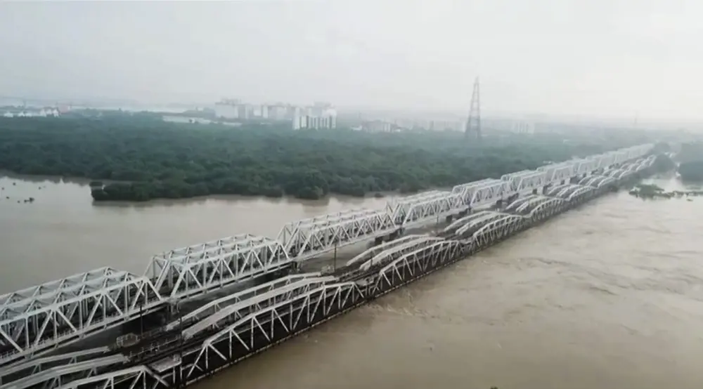 A view of the Loha Pul (Old Iron Bridge) after the water level in Yamuna river stood at 207.48 metres and floodwater from the raging river inundates nearby areas, in New Delhi | PTI