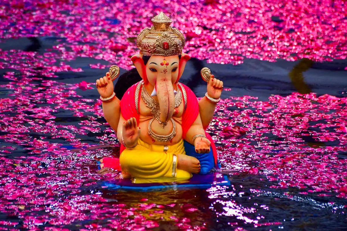 An idol of Lord Ganesh being immersed at an artificial pond after one-and-half day during the Ganesh Chaturthi festival, in Mumbai, Thursday, Aug. 28, 2025. (PTI Photo)