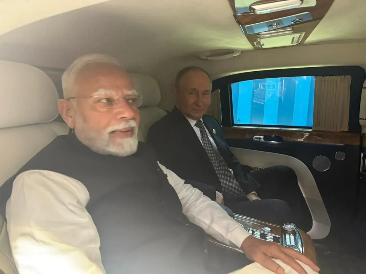 Prime Minister Narendra Modi and Russian President Vladimir Putin travel in the same car to the destination of their bilateral meeting in Tianjin, China | Photo: ANI