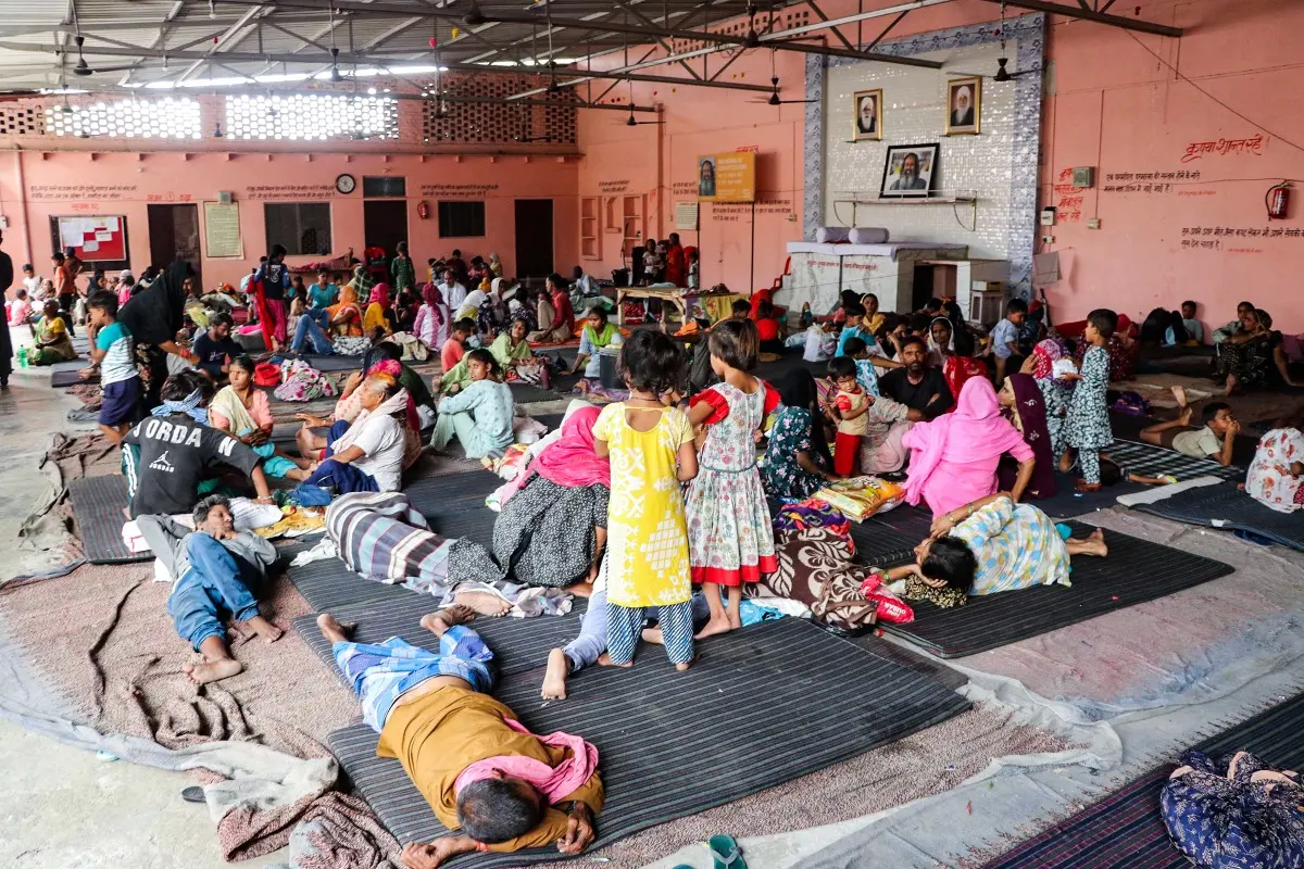 People take shelter in a flood relief camp after the Yamuna River crossed the danger mark | Photo: ANI