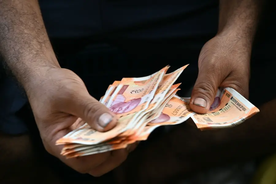 Rupee hits new record low against dollar at 88.27; Here's why