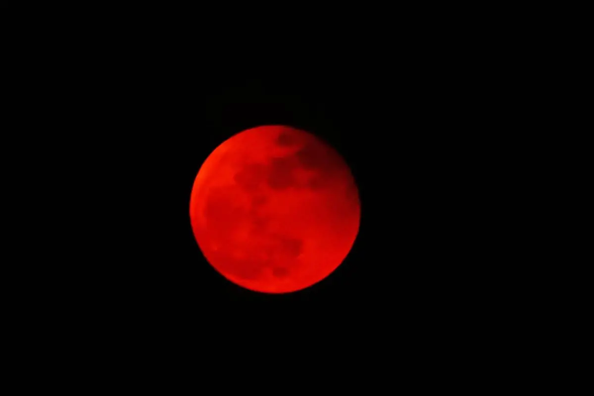 Skygazers will have a chance to see a 'Blood Moon' on September 7, 2025 during a total lunar eclipse visible across Asia and swathes of Europe and Africa. (Photo by Izhar KHAN / AFP)