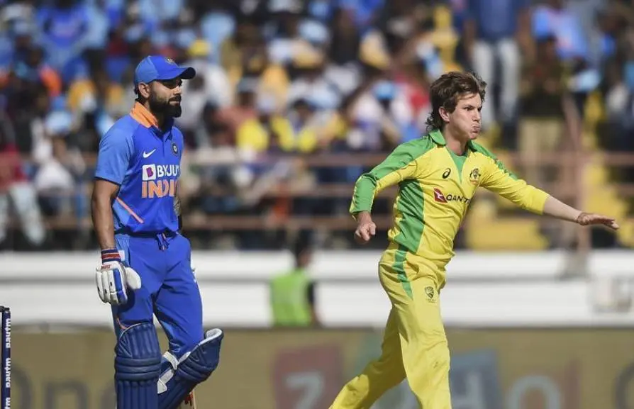 Virat Kohli and Adam Zampa Photo Courtesy: PTI
