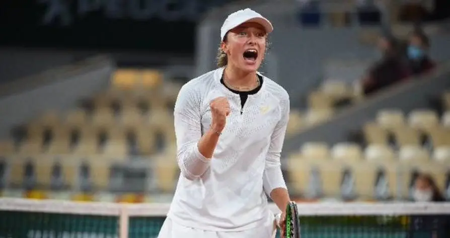ഇഗാ സ്വിയാറ്റെകിന്റെ വിജയാഘോഷം| Photo: twitter.com|rolandgarros