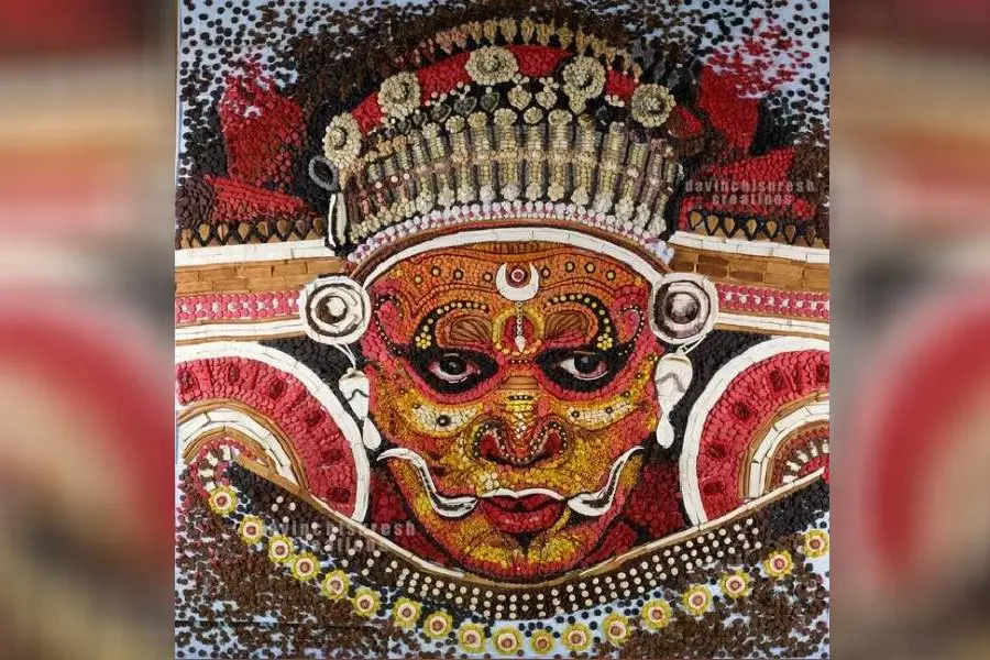ബിസ്കറ്റില് തീര്ത്ത തെയ്യക്കോലം; വേറിട്ട കലാവൈഭവത്തിന് കൈയടി നേടി ഡാവിഞ്ചി സുരേഷ്