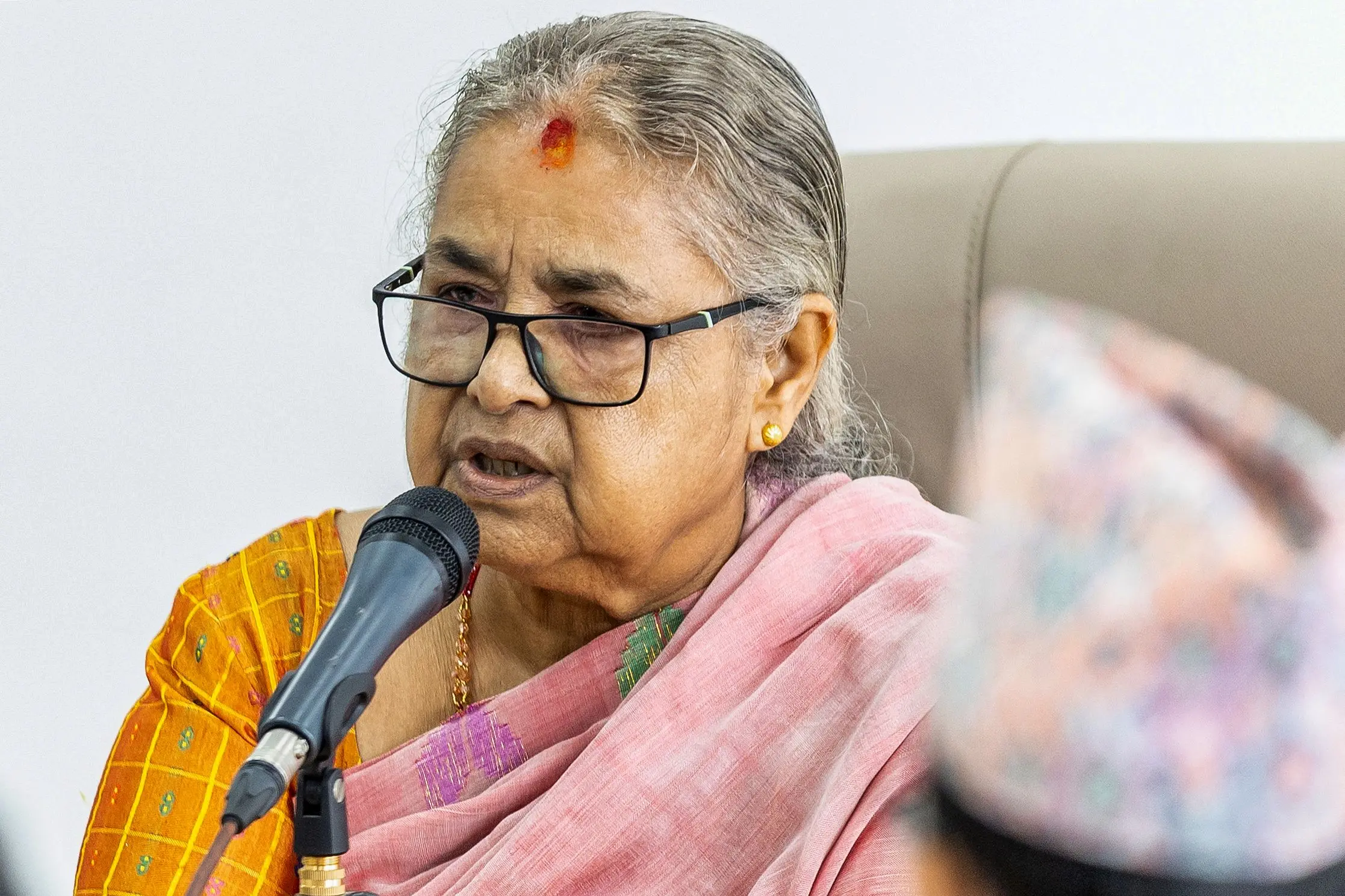 Newly-elected Prime Minister of Nepal's interim government Sushila Karki speaks with officials at the prime minister's office in Kathmandu | Photo: AFP