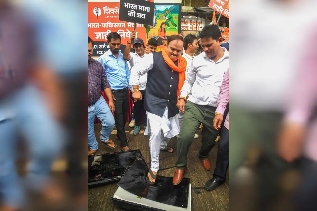Shiv Sena (UBT) workers break television sets during a protest against the India-Pakistan Asia Cup cricket match in Mumbai | Photo: PTI