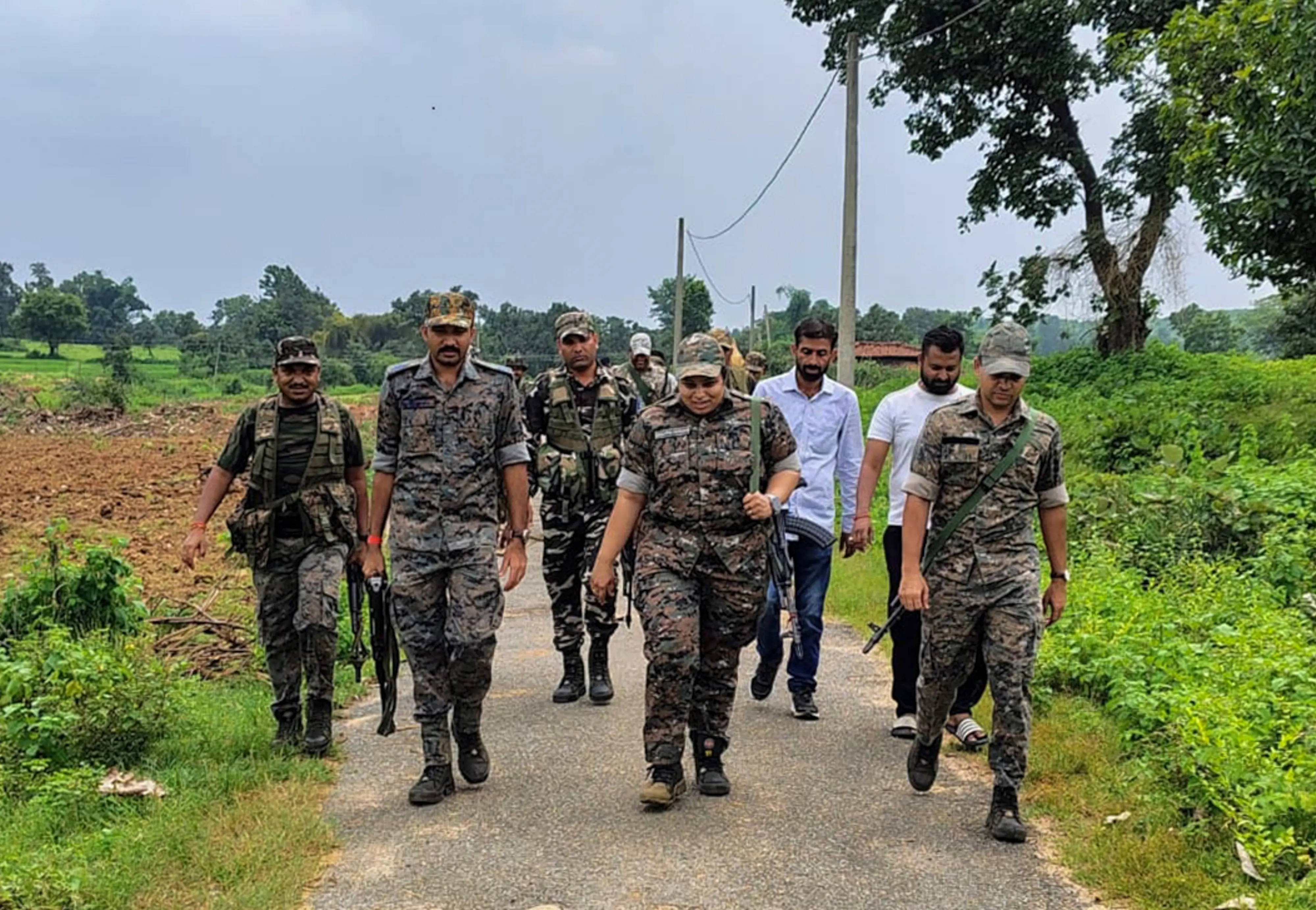 Security personnel arrive at the site where a Maoist was killed in a gunfight with security forces, in Jharkhand's Palamu district | Photo: PTI