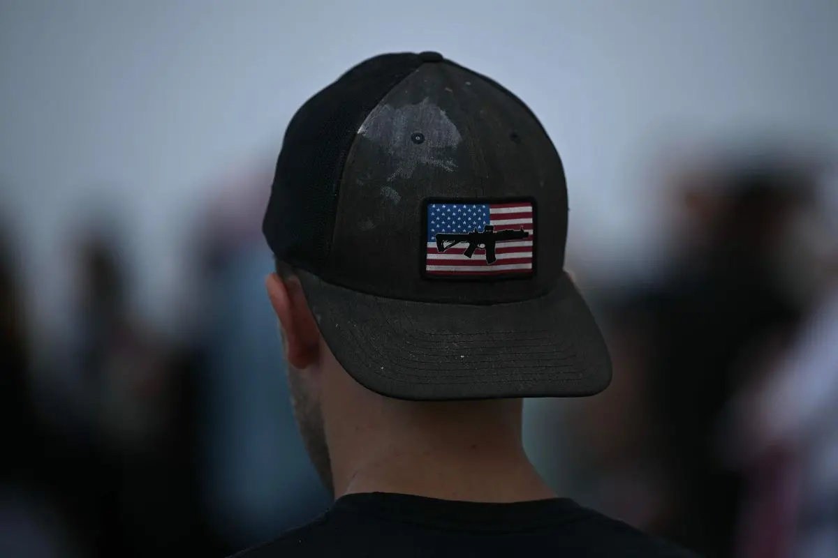 People wait in line outside the Kennedy Center for a prayer vigil for political activist Charlie Kirk in Washington, DC (Photo: AFP)