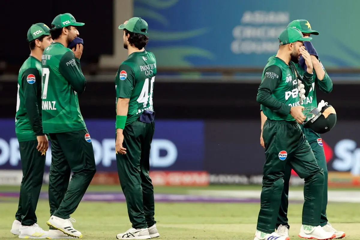 Pakistan's players look dejected after losing the Asia Cup 2025 match against India, at Dubai International Stadium in Dubai on Sunday. (ANI Photo)