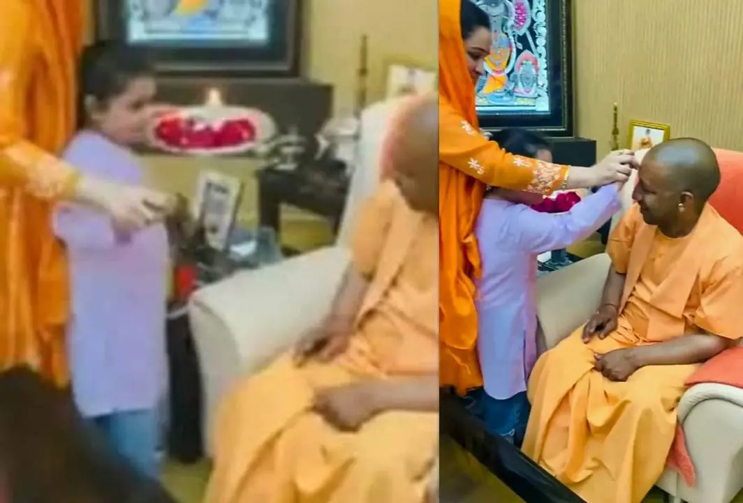 യോഗി ആദിത്യനാഥിന് തിലകം ചാര്‍ത്തുന്ന മുലായം സിങ് യാദവിന്റെ ചെറുമകള്‍ | Photo: ANI
