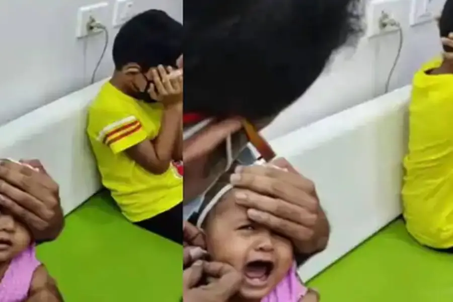 അനിയത്തിയുടെ കാതുകുത്ത്, വേദന സഹിക്കാനാകാതെ ചേട്ടന്; വൈറല് വീഡിയോ