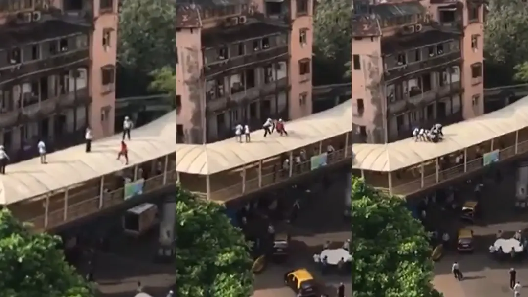 യുവാവിനെ രക്ഷപ്പെടുത്തുന്നു | Photo: Screen Grab, Twitter (@ndtv)