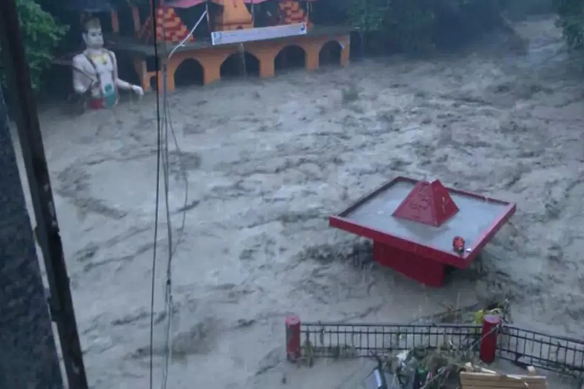 Tamsa river in spate and Tapkeshwar Mahadev temple inundated as heavy rainfall lashes Dehradun | Source: ANI video visual