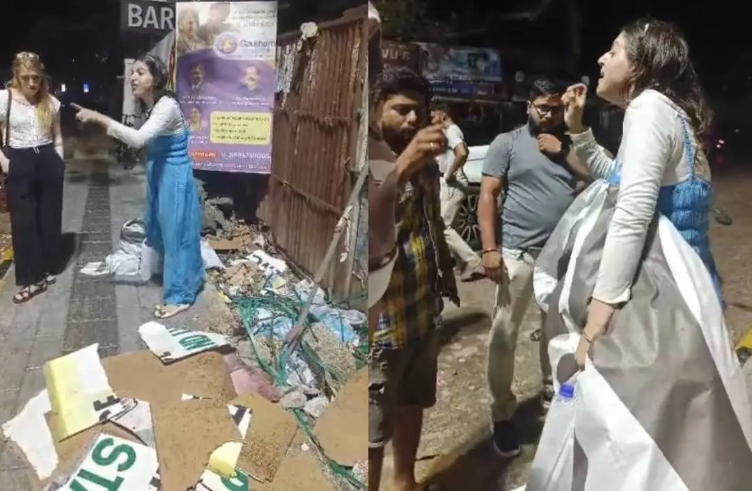 നാട്ടുകാരുമായി തർക്കിക്കുന്ന വിദേശ വനിത