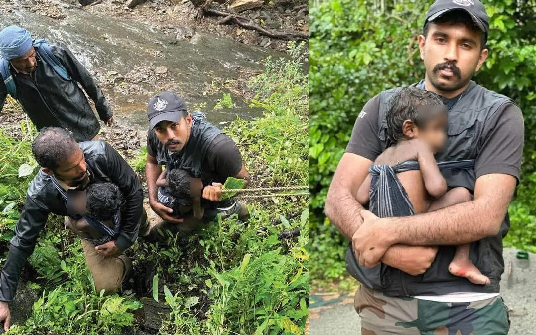 കുട്ടികളുമായി മല കയറുന്ന ഉദ്യോഗസ്ഥർ, അനൂപ് തോമസ് കുഞ്ഞിനൊപ്പം