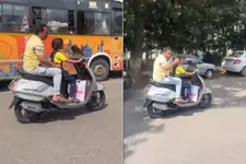 തിരക്കുള്ള റോഡില്‍ സ്‌കൂട്ടറോടിച്ച് ചെറിയ കുട്ടി, പിന്നിലിരുന്ന് പിതാവ്; വീഡിയോ വൈറൽ, വിമർശനം