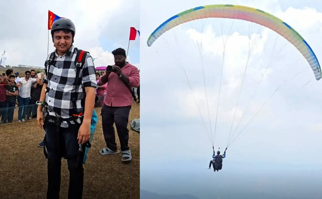 മന്ത്രി പാരാഗ്ലൈഡിങ് നടത്തുന്ന ദൃശ്യം