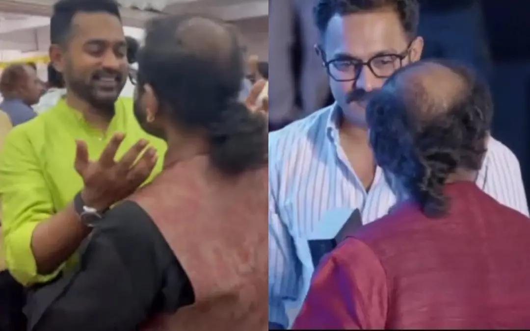 മുഖ്യമന്ത്രിയുടെ ഇഫ്താര് വിരുന്നില്വെച്ച് ആസിഫ് അലി രമേശ് നാരായണിനെ ആലിംഗനംചെയ്യുന്നു, വിവാദത്തിന് കാരണമായ സംഭവത്തില്നിന്ന് | Photo: Screen grab/ Mathrubhumi News