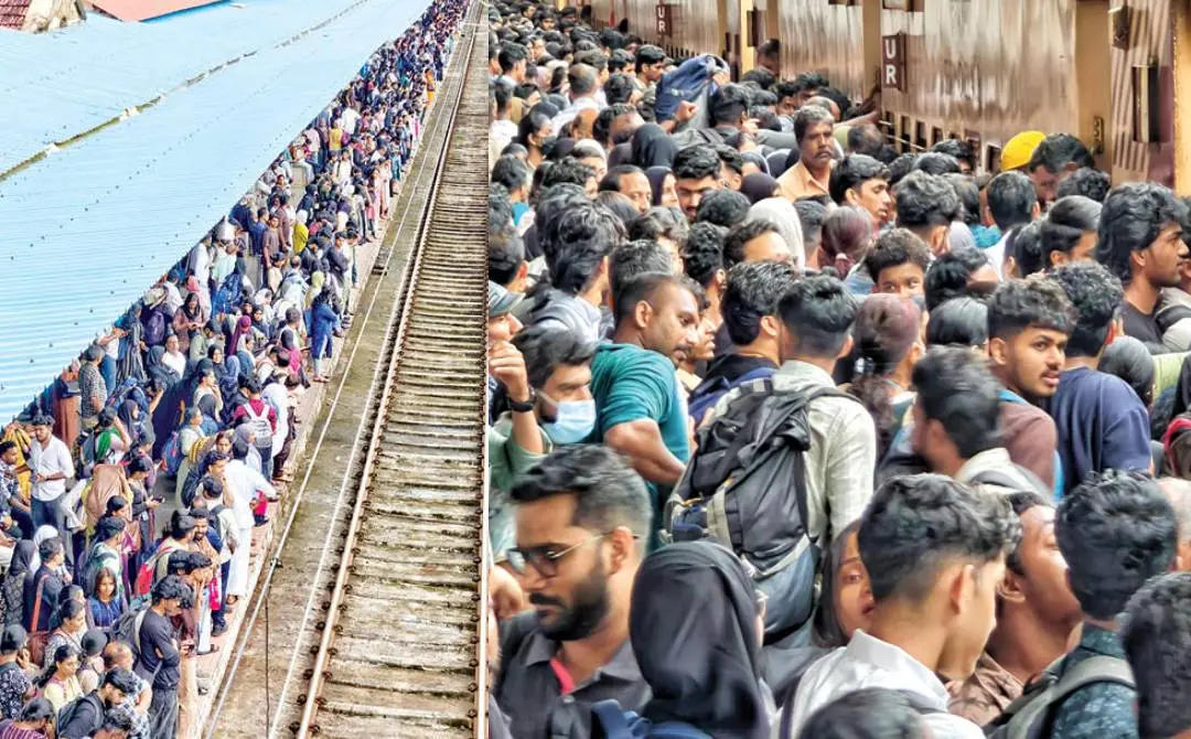 കോഴിക്കോട് സ്റ്റേഷനിലെ പ്ലാറ്റ്ഫോമിൽ ട്രെയിനിൽ കയറാൻ കാത്തുനിൽക്കുന്നവർ