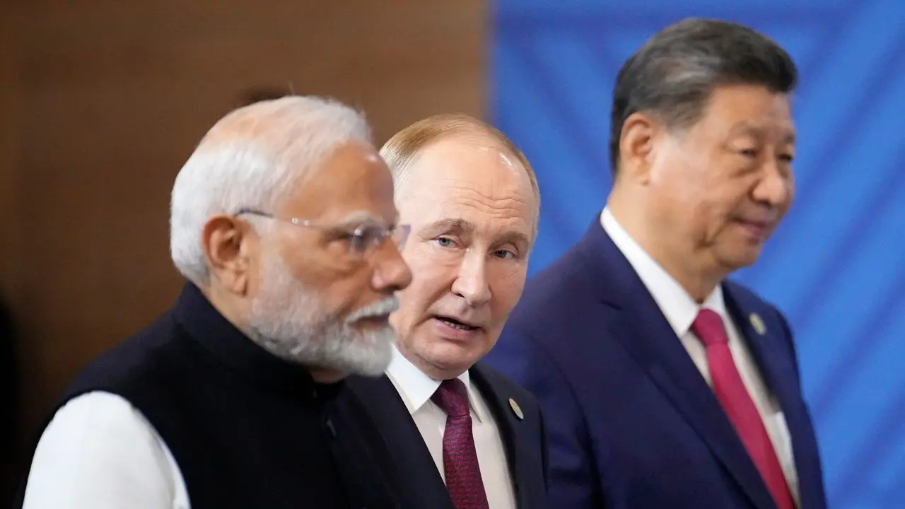 നരേന്ദ്രമോദി, വ്ളാദിമിർ പുതിൻ, ഷി ജിന്പിങ് | Photo: AP