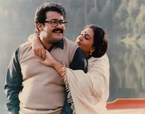 Mohanlal and Urvashi during Midhunam (1993)