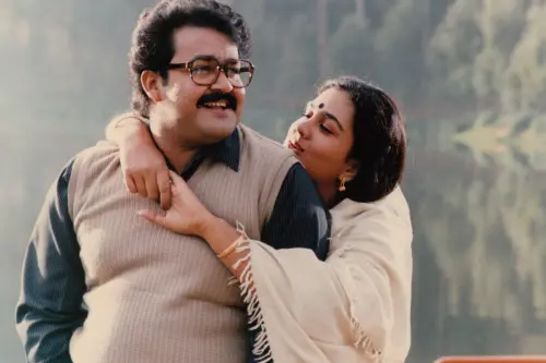 Mohanlal and Urvashi during Midhunam (1993)