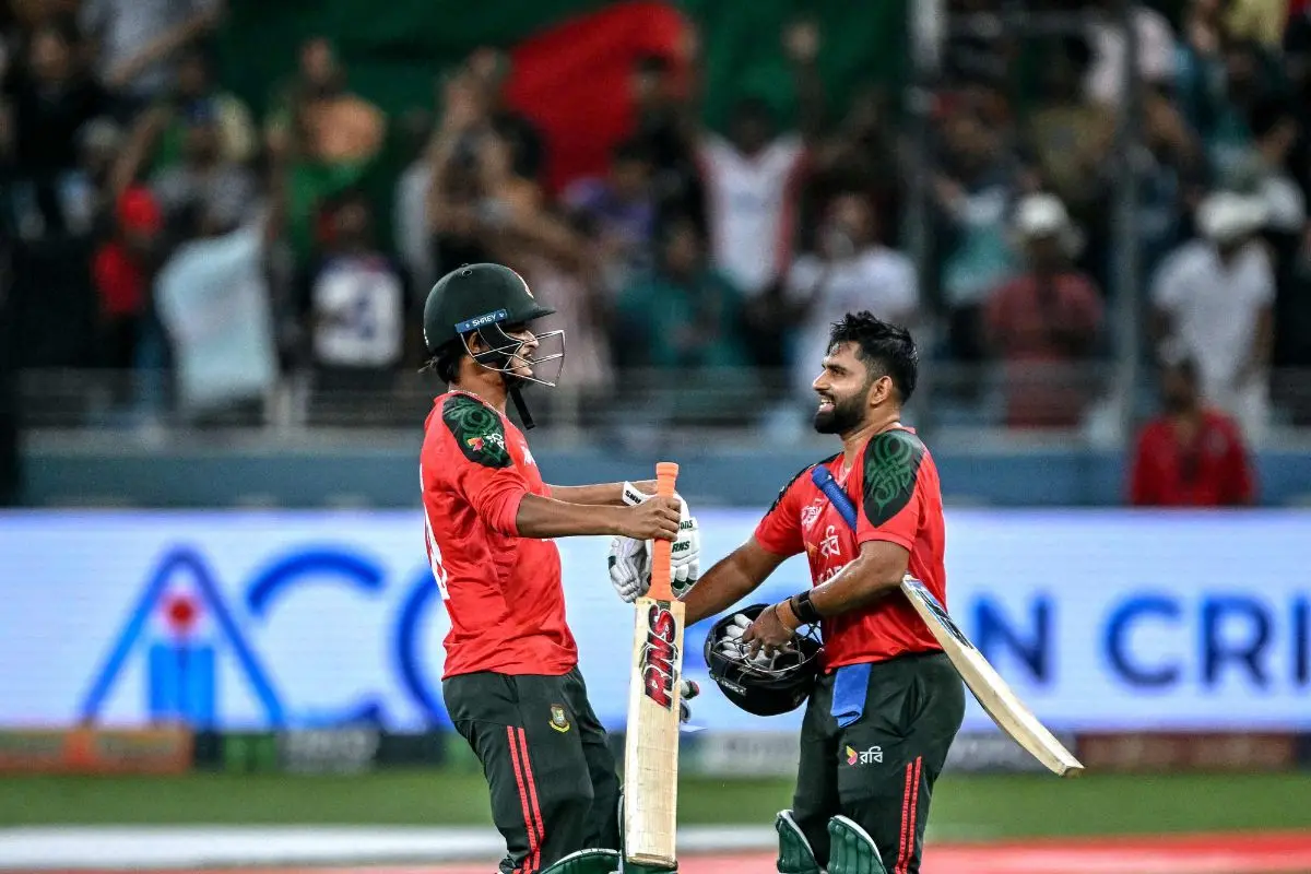 Bangladesh's Shamim Hossain (R) and Nasum Ahmed celebrate their team's win in the Asia Cup 2025 Super Four Twenty20 international cricket match between Bangladesh and Sri Lanka | Photo: AFP